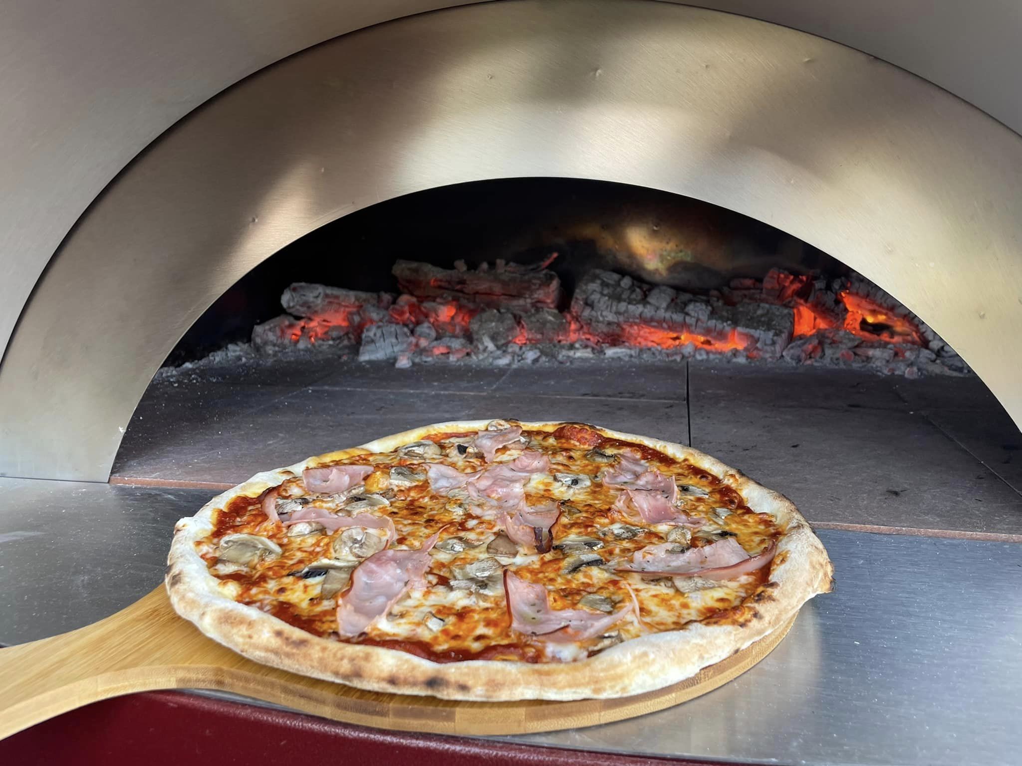 Pizza oven in operation at The View Rooftop Bar kitchen
